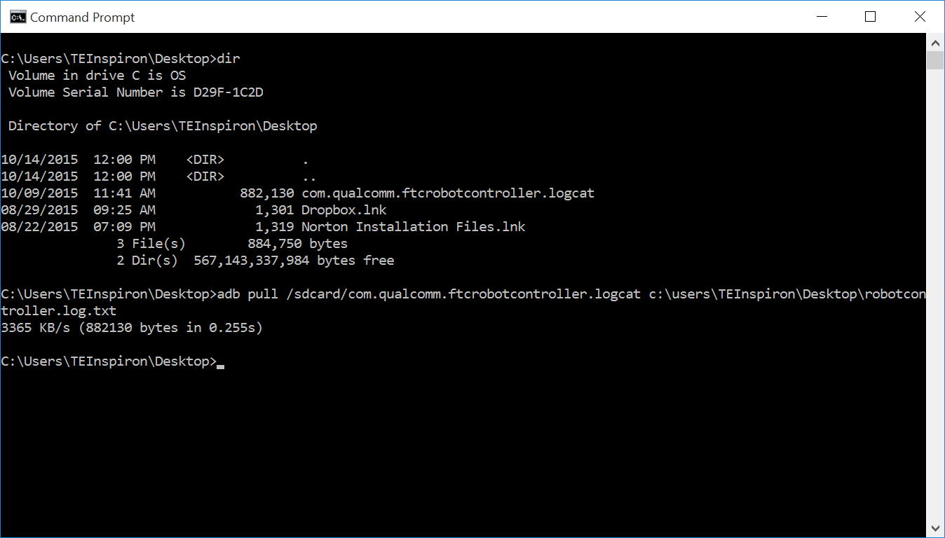 Command Prompt showing a directory listing followed by an adb pull command copying the log file successfully.