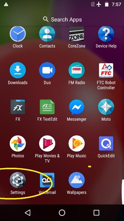 Android home screen with the Settings app icon circled.