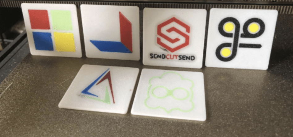 6 multicolor square 3d printed logos.
