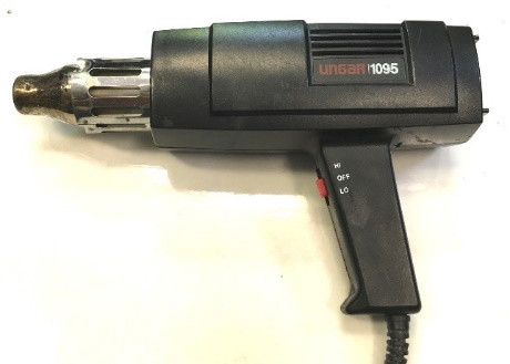 A black handheld heat gun with hi, off, and lo switch positions.