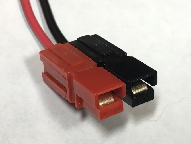 A mated red and black Anderson Powerpole connector pair showing the correct interlocking orientation.