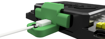A close-up of the green cable clip holding a USB cable secured to the port of a REV Expansion Hub.