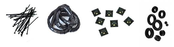 Four wire management products side by side, zip ties, spiral wire wrap, adhesive cable tie mounts, and rubber grommets.